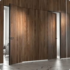 Скрытые межкомнатные двери с отделкой под дерево создают эффект цельной стены в интерьере.